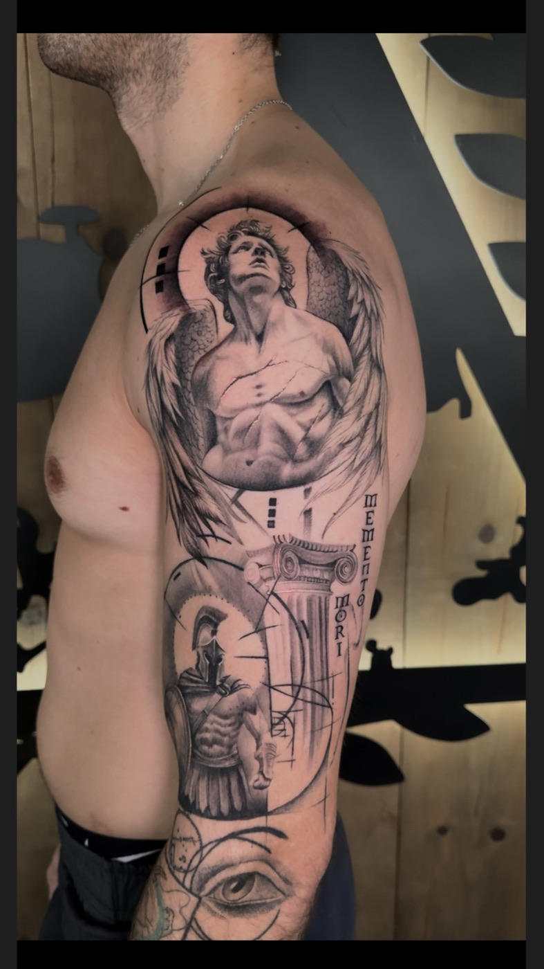 Memento mori angel statue and Spartan warrior black and grey sleeve tattoo by Gerald Everfade